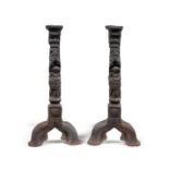 A pair of Gothic style cast iron andiron.