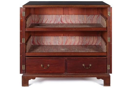 A George III mahogany and crossbanded low linen press possibly, attributable to Thomas Chippendale. - Image 2 of 2