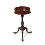 An unusual George III carved mahogany tripod table.