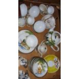 Two Japanese porcelain part tea services, together with a silver plated salt and pepper in form of