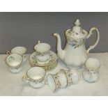 A Royal Albert Bone China tea service in the Brigadoon pattern, comprising; tea pot, six cups and