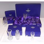 A group of Edinburgh Crystal comprising: two bud vases, two port glasses, two brandy glasses, four