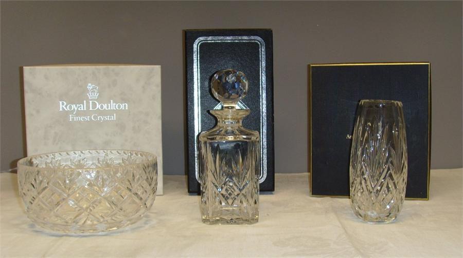 A Royal Doulton Crystal bowl, an Arthur Price of England vase and Edinburgh Crystal decanter, all