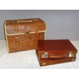 A 1950s patchwork leather shooting case with a leather strap and canvas lining, together with a
