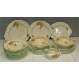 A Norville Ware Cartwright & Edwards Ltd part dinner service comprising two tureens, six soup bowls,