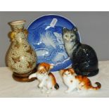 A miniature Satsuma vase on a carved hardwood stand, a Copenhagen porcelain cat plate, a pair of