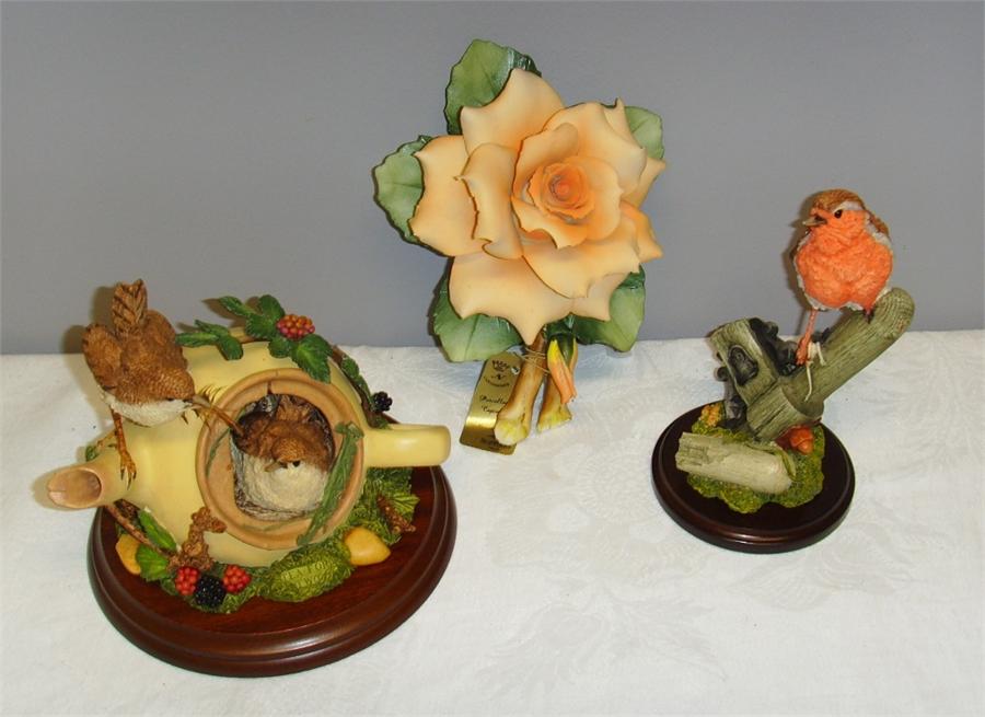 A Country Artists Robin, a Capodimonte Yellow Rose, signed to the base by the artist, and an