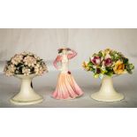 Two Royal Doulton flower groups 'Carnation' H5084, the other unnamed, and a Coalport lady '