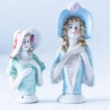 Two antique porcelain German pin cushion half dolls, one numbered 15728.