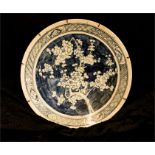 A 19th century blue and white Chinese charger depicting prunus blossom, 38cm diameter.