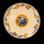 A set of twelve Minton porcelain plates, the central roundels depicting the Willow pattern, the