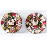 A pair of antique ceramic 'collage' plates with figures in chariots to the centres.