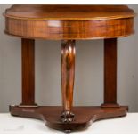 A Victorian mahogany demi lune side table, with a carved bracket form front leg, and low shelf, 76