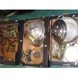 A quantity of silver plate including two large tureens, a pair of iron andirons, antique brass