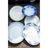 A group of miscellaneous ceramics including oval platters of various factories.