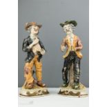 A pair of Capodimonte Tramp figures, marked to the bases.