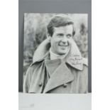 Autograph: a signed photograph of Roger Moore.