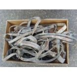 A quantity of leather horse tack.