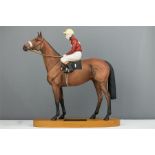 A Beswick Connoisseur model racehorse Red Rum, Winner of The Aintree Grand National 1973 & 1974,
