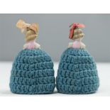 A pair of 1930s crochet egg cosy's, with ceramic d