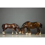 A Beswick Shire horse and a ceramic model pony. (2)