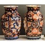 A pair of 20th century Imari pattern vases of balu