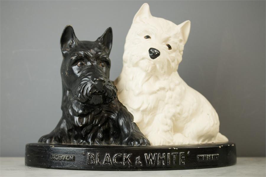 A 'Black and White Scotch Whisky Scottie dogs Brentleigh ware advertising display.