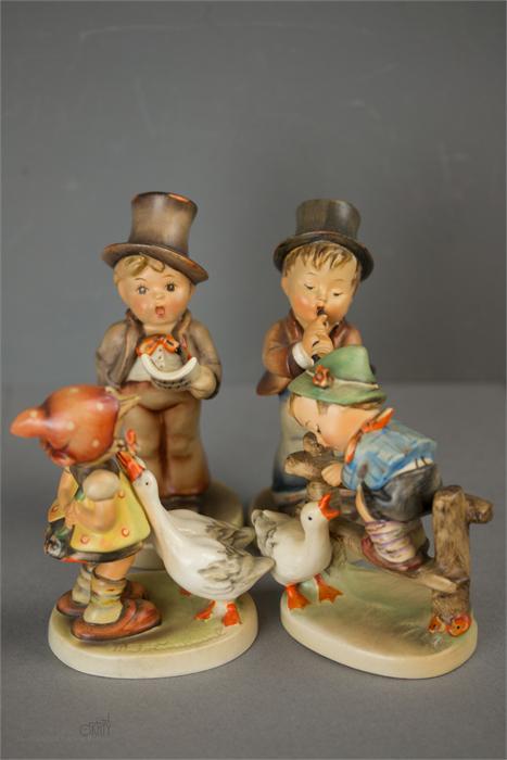 Four German Goebel Hummel figurines: Barnyard Hero 195 2/0, Best Friends 731, Seranade 85/0, Goose