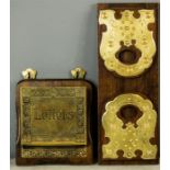 A brass 'Letter's' rack, together with a brass book slide with shaped and pierced brass mounts.