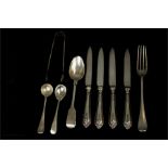 A part set of four silver handled fruit knives; Sheffield 1926, a silver teaspoon, Sheffield 1840 by