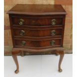 A mahogany set of serpentine fronted drawers, rais