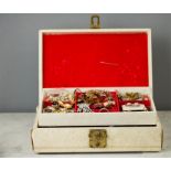 A jewellery box containing costume jewellery to include silver bangles, micromosaic bracelet,