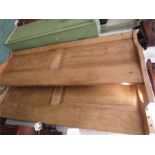 A pine sleigh double bed.