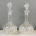 A pair of cut crystal decanters, circa 1900, with the original stoppers.