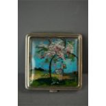 A Vintage Art Deco French powder compact by Coty of Paris, butterfly wing picture depicting a girl