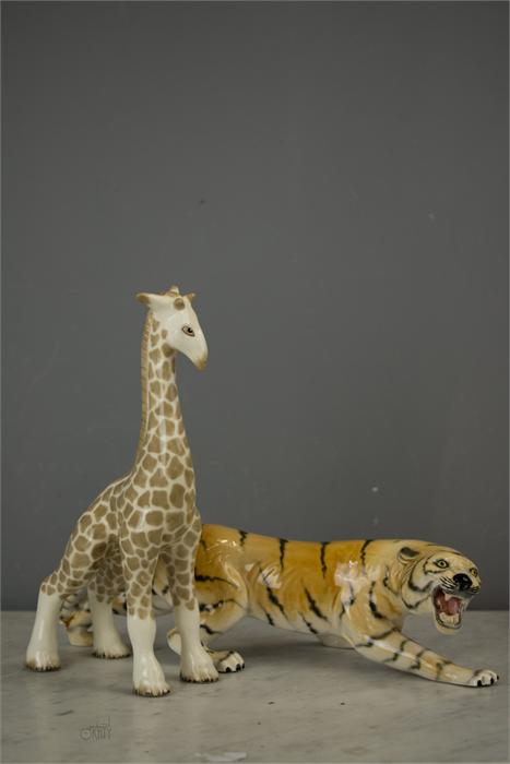 A WR Midwinter Ltd Burslem Giraffe, 30cm high, and a ceramic tiger. (2)