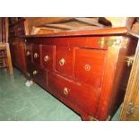 A Campaign style mahogany chest with variously siz