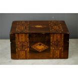 A 19th century parquetry mahogany box, decorated with inlaid bands of crosses, with diamond motif to