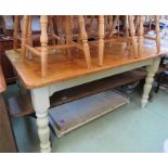 A pine kitchen table with painted base, with singl