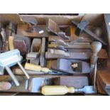 A quantity of furniture restorers wooden planes, chisels, and sundry tools of various size and form.
