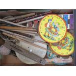 A quantity of instruments including an Acme Toys, tambourines, African leather skin drums of various