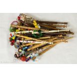 A quantity of turned treen lace makers bobbins wit