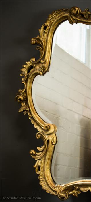 A giltwood wall mirror with Rococo style scrollwor - Image 2 of 3