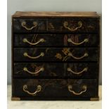 A 19th century black lacquered collectors/jewellery cabinet with two short over four long