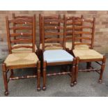 A set of six oak ladderback dining chairs, five wi