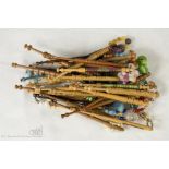 A quantity of turned treen lace makers bobbins wit