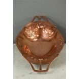 An Art Nouveau copper oval dish.