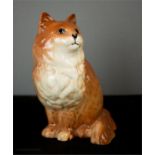 A Beswick cat, impressed 1867 to the base, 21cm high.