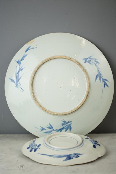 A late 19th century blue and white charger with fo - Image 2 of 4