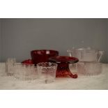 A group of Sowerby glassware, to include three dishes modelled with figures, a red 'lattice' work